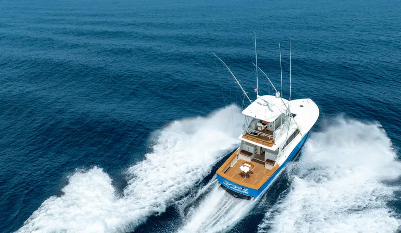 Pez Collector Yacht Photos Pics Custom Marcam 43 Convertible 2010 yacht cruising on open blue sea.