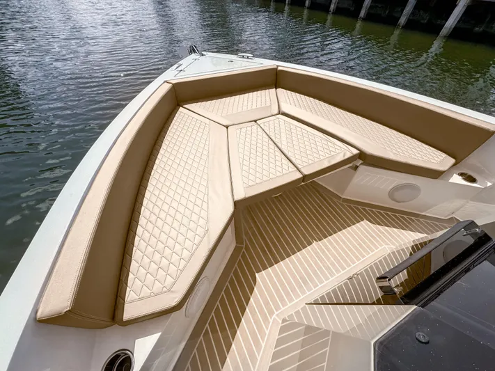  Yacht Photos Pics 2024 De Antonio Yachts D28 Open, featuring luxurious beige seating and sleek design.