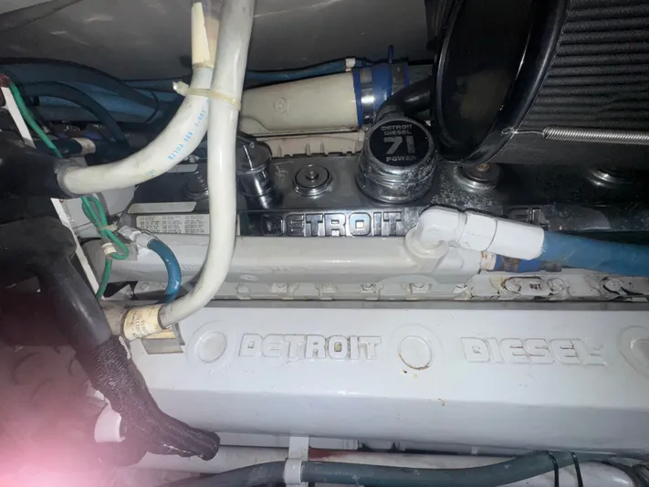Hear After Yacht Photos Pics Engine compartment of a 1995 Bertram 50 Convertible with Detroit Diesel components.