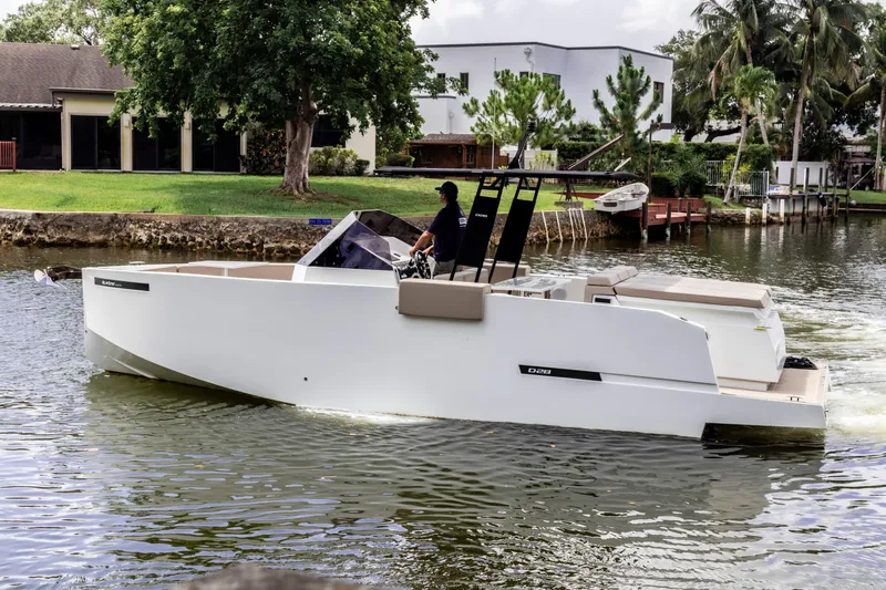  Yacht Photos Pics 2024 De Antonio Yachts D28 Open cruising on a serene waterway.