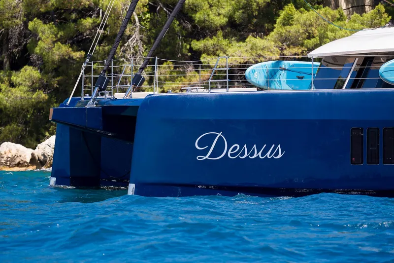Dessus Yacht Photos Pics Luxury Sunreef 60 catamaran "Dessus" on blue water, 2022 model.
