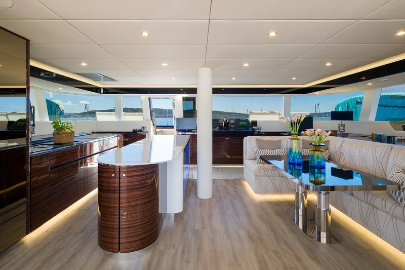 Dessus Yacht Photos Pics Luxurious interior of 2022 Sunreef 60 yacht with modern design and elegant furnishings.