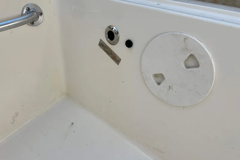  Yacht Photos Pics Interior detail of a 2007 Henriques 42 Express boat, featuring a metal handle and circular fittings.