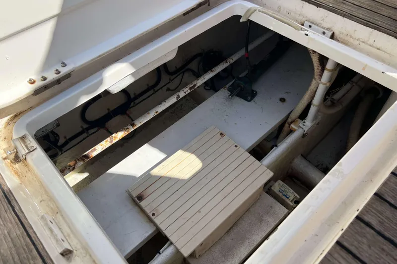  Yacht Photos Pics Open engine compartment of a 2007 Henriques 42 Express boat, showing internal components.