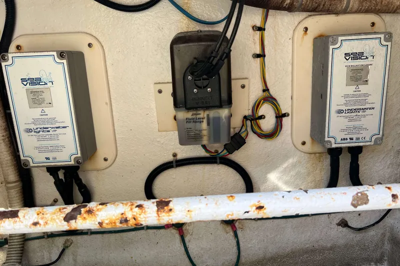  Yacht Photos Pics Electrical components on a 2007 Henriques 42 Express boat, featuring Sea Vision underwater lights.