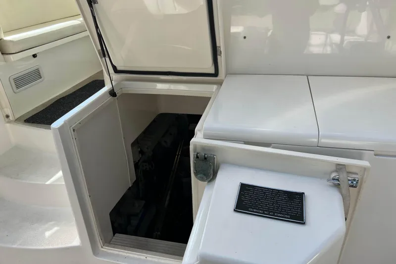  Yacht Photos Pics 2007 Henriques 42 Express engine compartment with open hatch, showcasing interior details.