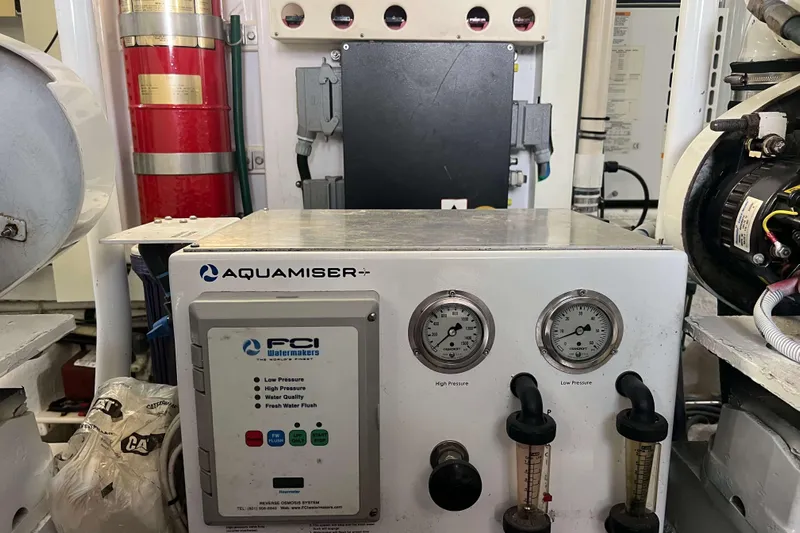  Yacht Photos Pics Engine room of 2007 Henriques 42 Express with Aquamiser watermaker system.