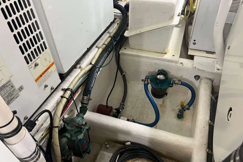  Yacht Photos Pics Engine room of 2007 Henriques 42 Express boat with visible wiring and machinery.