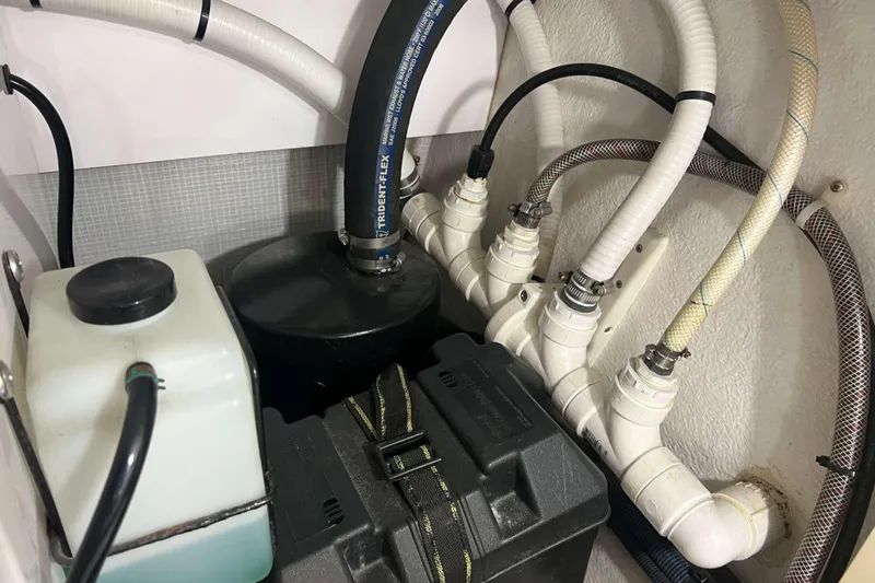  Yacht Photos Pics Engine compartment of a 2007 Henriques 42 Express with hoses and components.