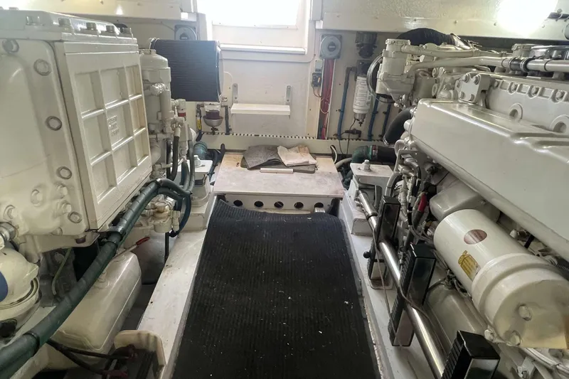  Yacht Photos Pics Engine room of a 2007 Henriques 42 Express boat, showcasing machinery and components.