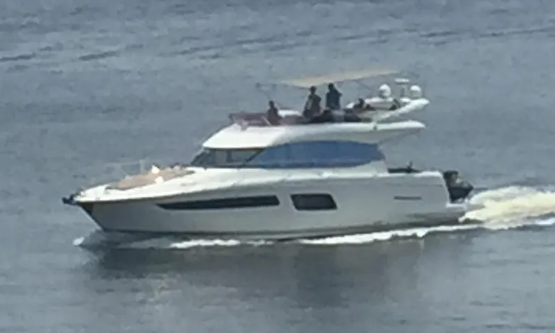 Relax Yacht Photos Pics 2015 Prestige 500 yacht cruising on open water.