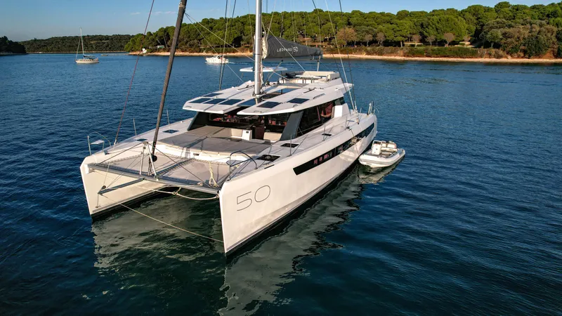 Solaia Yacht Photos Pics Luxury Leopard 50 catamaran sailing in serene waters, 2020 model.
