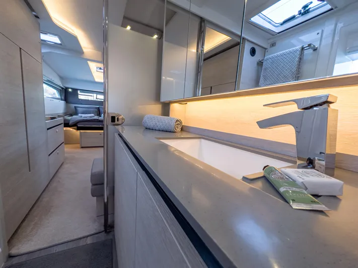 Solaia Yacht Photos Pics Luxurious bathroom interior on a 2020 Leopard 50 yacht, featuring modern fixtures and elegant design.
