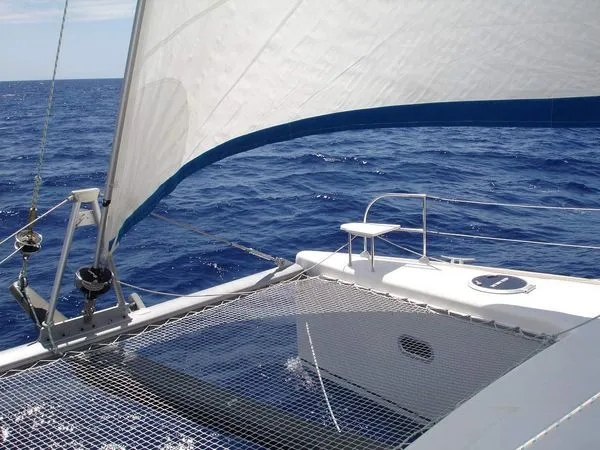 Ocean Mandalay Yacht Photos Pics 2003 Fountaine Pajot Belize 43 sailing on open sea.
