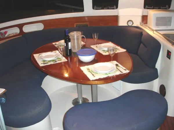 Ocean Mandalay Yacht Photos Pics Interior of 2003 Fountaine Pajot Belize 43 with dining table.