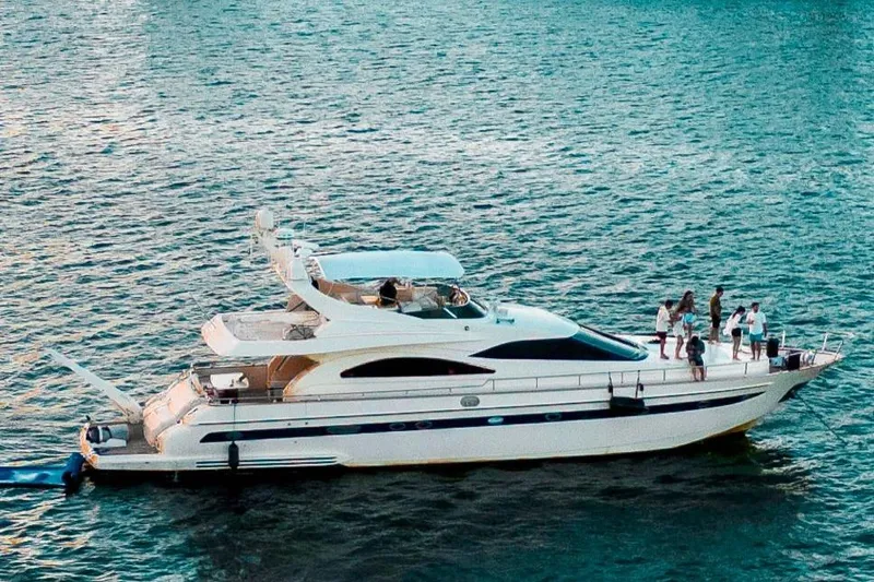  Yacht Photos Pics Luxury Astondoa 72 GLX yacht cruising on open water, 1998 model.