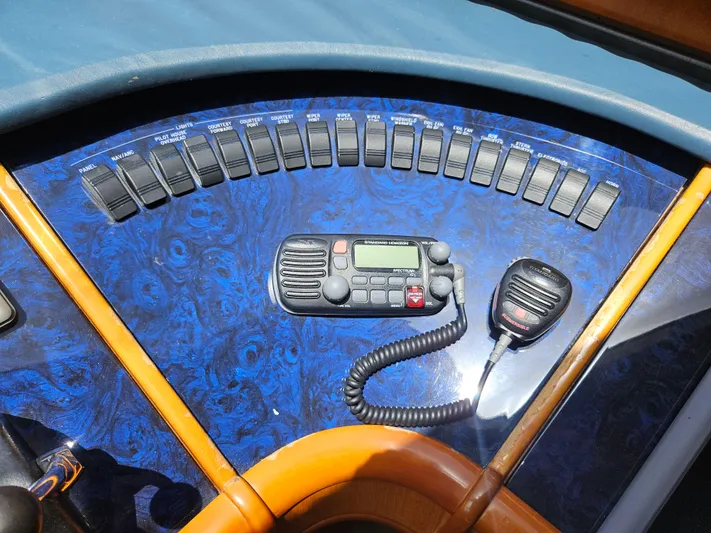  Yacht Photos Pics Control panel of 1998 Astondoa 72 GLX yacht with radio and switches.