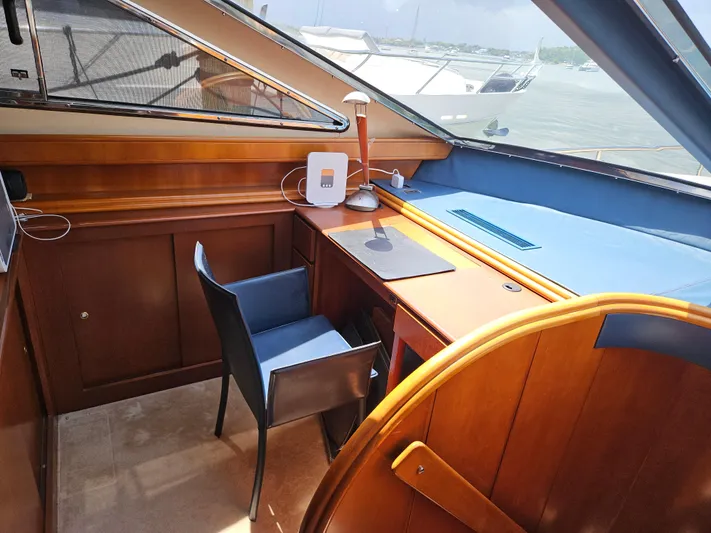  Yacht Photos Pics Luxurious 1998 Astondoa 72 GLX yacht interior with wooden desk and chair.