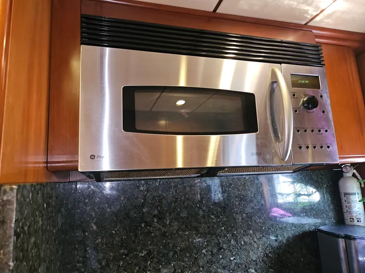  Yacht Photos Pics Stainless steel microwave in Astondoa 72 GLX yacht kitchen, 1998 model.