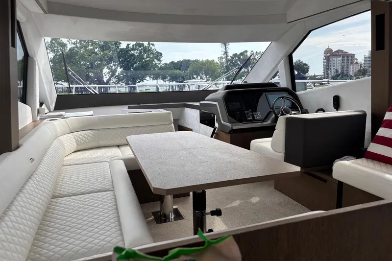  Yacht Photos Pics Interior of 2020 Galeon 500 Fly yacht with luxurious seating and helm.