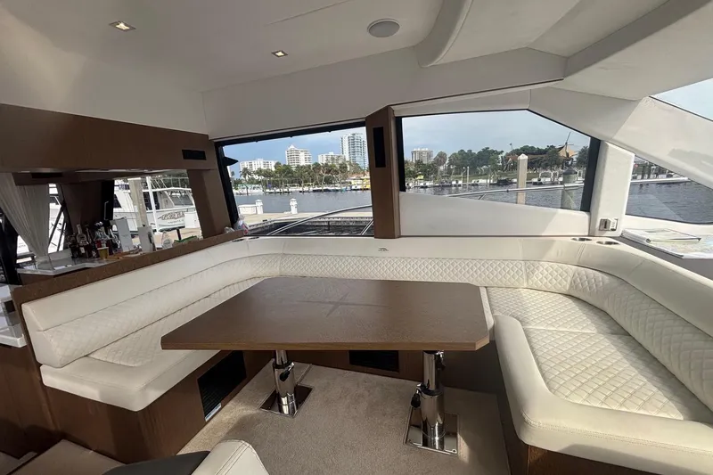  Yacht Photos Pics Luxurious interior of 2020 Galeon 500 Fly yacht with elegant seating and waterfront view.