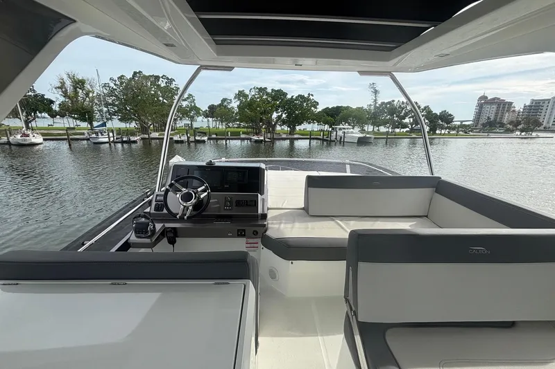  Yacht Photos Pics Interior view of 2020 Galeon 500 Fly yacht with helm and seating area.
