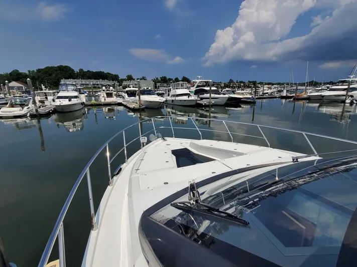  Yacht Photos Pics Galeon 500 Fly 2020 yacht docked at a marina with other boats.