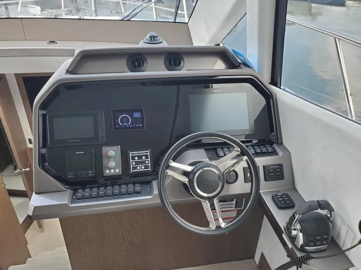  Yacht Photos Pics Helm station of 2020 Galeon 500 Fly yacht with modern navigation equipment.