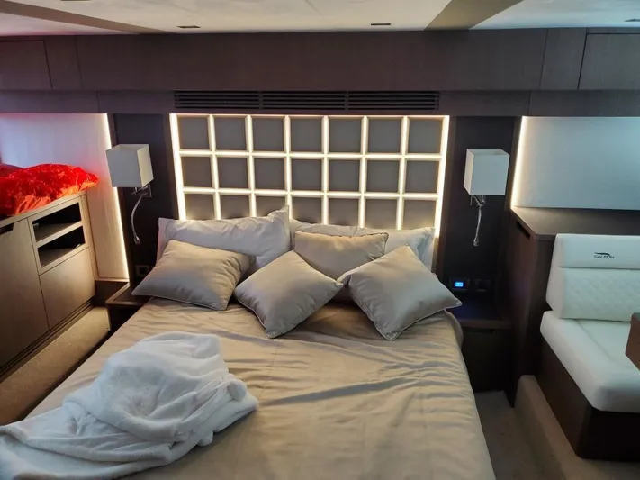  Yacht Photos Pics Luxurious bedroom in 2020 Galeon 500 Fly yacht with modern lighting and cozy bedding.