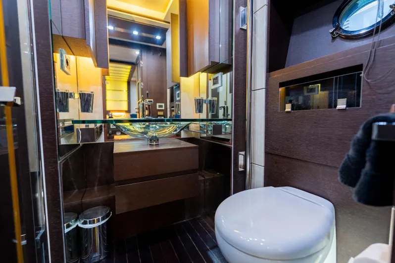  Yacht Photos Pics Luxurious bathroom on 2008 Azimut 103S yacht with modern fixtures and elegant design.