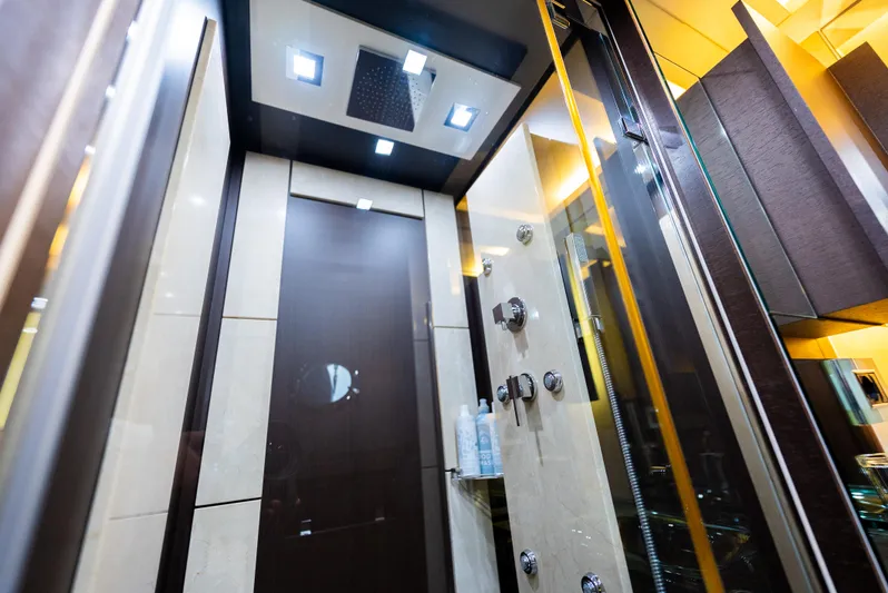  Yacht Photos Pics Luxurious shower interior on a 2008 Azimut 103S yacht, featuring modern fixtures and lighting.