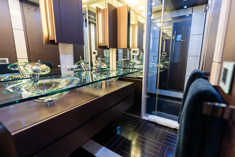  Yacht Photos Pics Luxurious bathroom interior on 2008 Azimut 103S yacht with modern glass sinks and elegant fixtures.