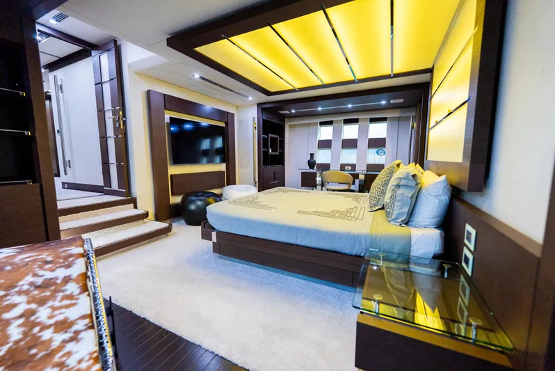  Yacht Photos Pics Luxurious bedroom interior on 2008 Azimut 103S yacht with modern design and ambient lighting.