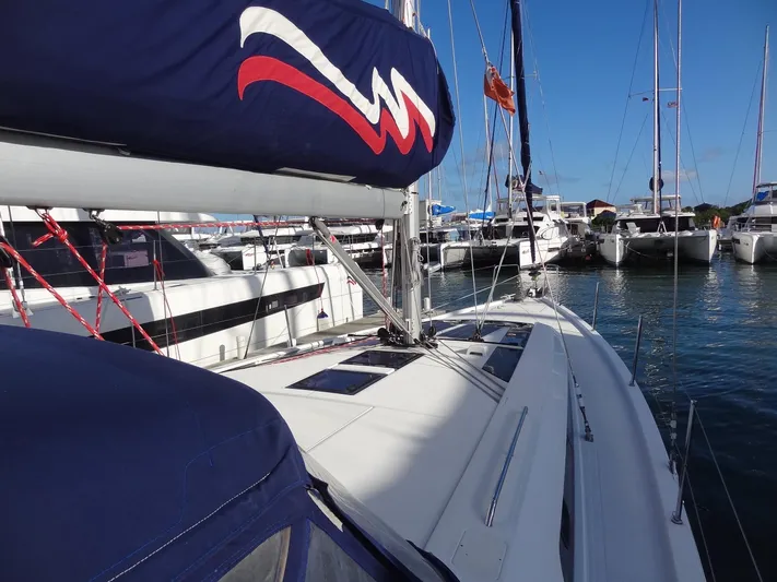 Exit Strategy Yacht Photos Pics Beneteau Oceanis 46.1 2020 sailboat docked in a marina on a sunny day.