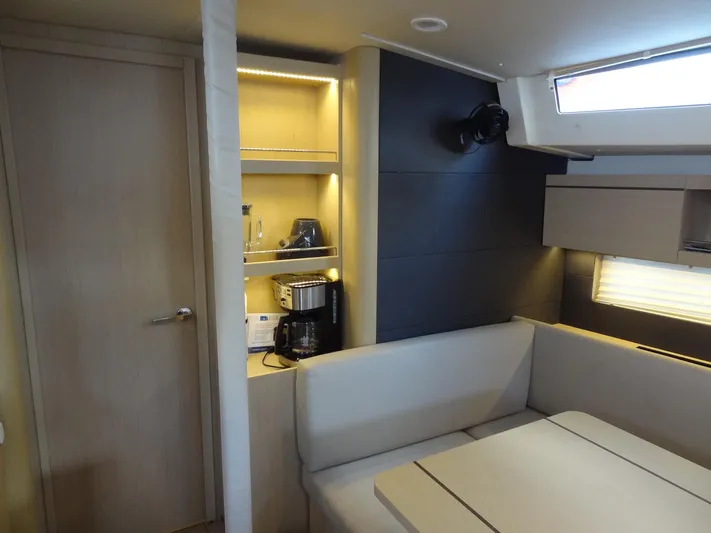 Exit Strategy Yacht Photos Pics Interior of 2020 Beneteau Oceanis 46.1 yacht with modern kitchen and seating area.