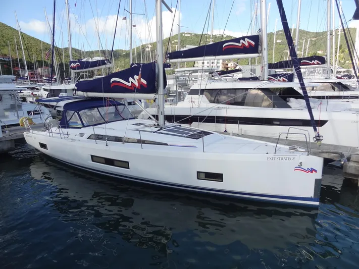 Exit Strategy Yacht Photos Pics 2020 Beneteau Oceanis 46.1 sailboat docked in a marina.