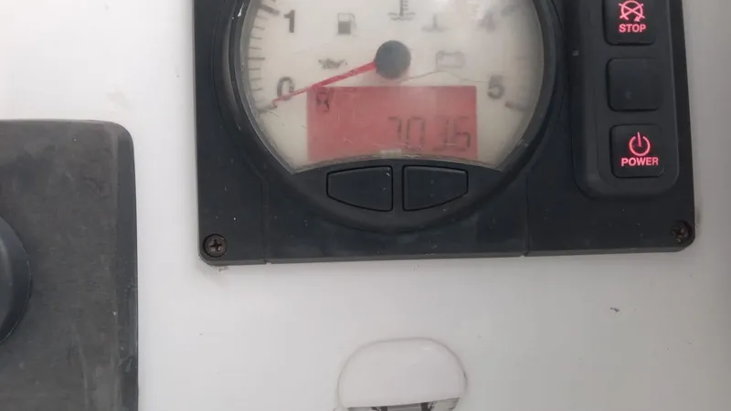 Exit Strategy Yacht Photos Pics Close-up of Beneteau Oceanis 46.1 2020 control panel with gauge and buttons.