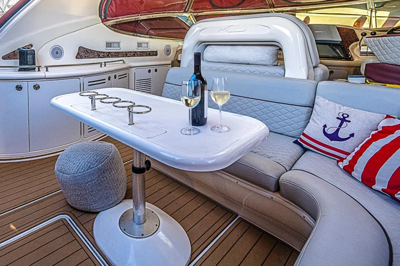 Carolina Girl Yacht Photos Pics Luxurious interior of 2002 Sea Ray 550 Sundancer with wine and nautical decor.