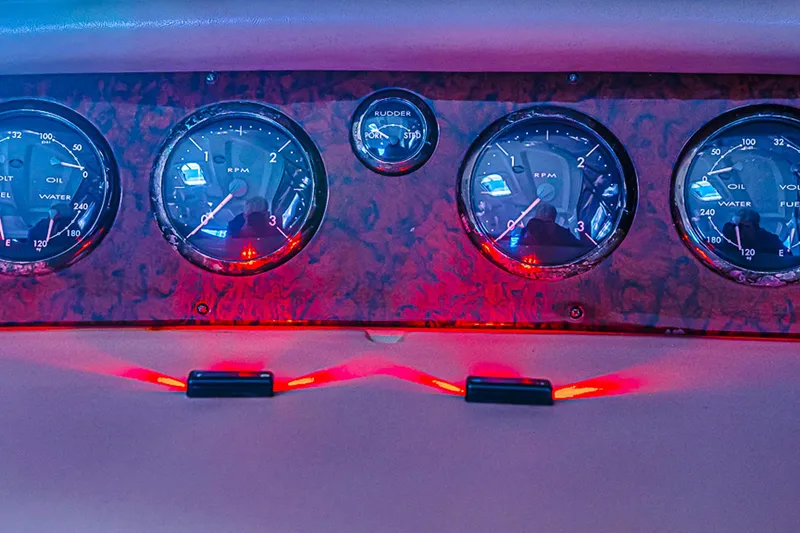 Carolina Girl Yacht Photos Pics Dashboard of 2002 Sea Ray 550 Sundancer with illuminated gauges and controls.