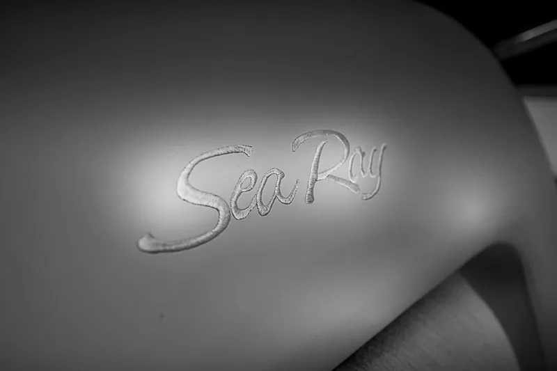 Carolina Girl Yacht Photos Pics Sea Ray logo on 2002 Sea Ray 550 Sundancer yacht, close-up view.