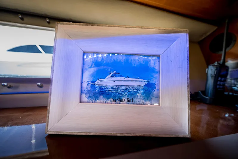 Carolina Girl Yacht Photos Pics Framed photo of 2002 Sea Ray 550 Sundancer yacht, labeled "Carolina Girl."