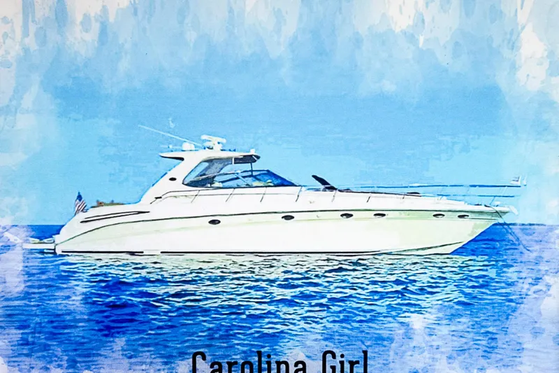 Carolina Girl Yacht Photos Pics 2002 Sea Ray 550 Sundancer yacht on blue ocean, labeled "Carolina Girl."