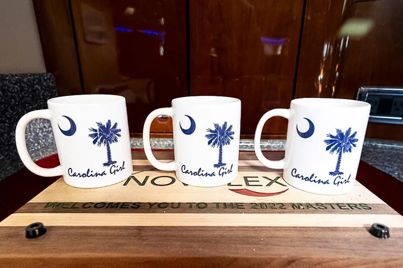 Carolina Girl Yacht Photos Pics Three "Carolina Girl" mugs on a Sea Ray 550 Sundancer yacht, 2002 model.