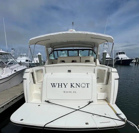 Why Knot Yacht Photos Pics 1996 Tiara Yachts 3500 Express named "Why Knot" docked at marina, Wayne, PA.