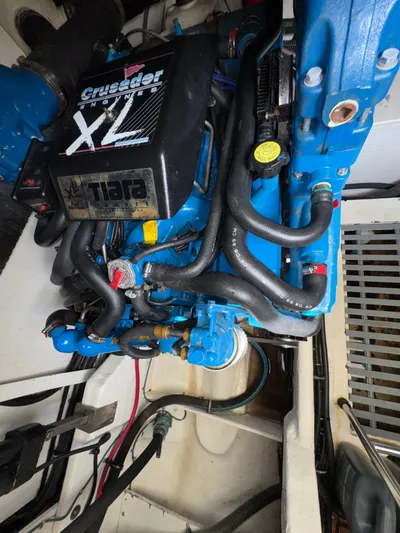 Why Knot Yacht Photos Pics Engine compartment of a 1996 Tiara Yachts 3500 Express with Crusader XL engine.