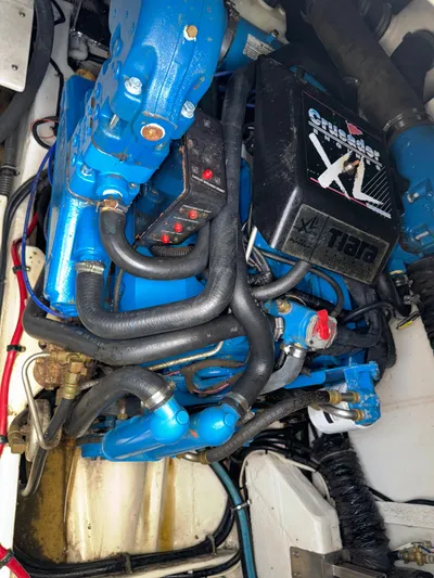 Why Knot Yacht Photos Pics Engine compartment of a 1996 Tiara Yachts 3500 Express with Crusader XL engine.