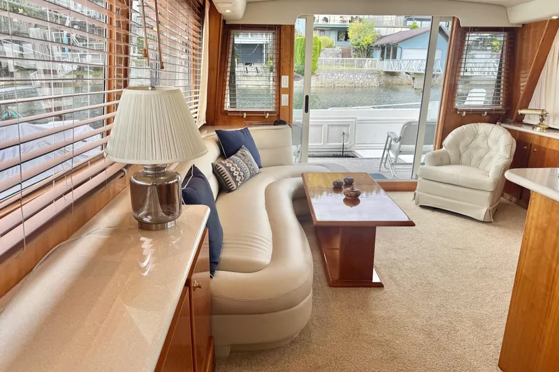  Yacht Photos Pics Luxurious interior of 2001 Navigator 56 Classic Pilothouse yacht with elegant furnishings.