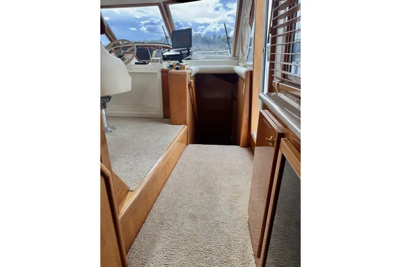  Yacht Photos Pics Pilothouse interior of 2001 Navigator 56 Classic, featuring helm and navigation equipment.