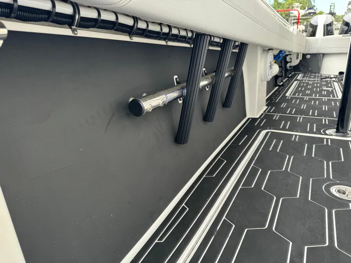  Yacht Photos Pics 2024 Nor-Tech 392 Super Fish boat interior with rod holders and non-slip flooring.