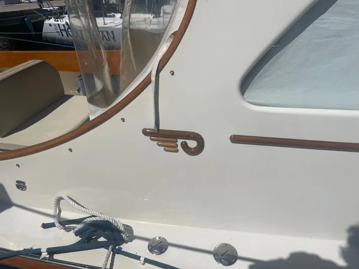  Yacht Photos Pics 1999 Hinckley Picnic boat detail with wood trim and nautical rope.